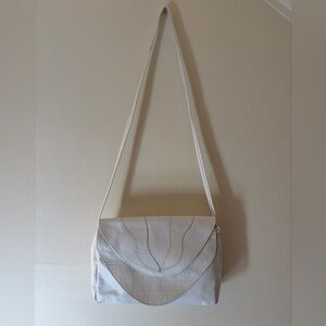 Minimalist Cream Shoulder Bag with Curved Flap